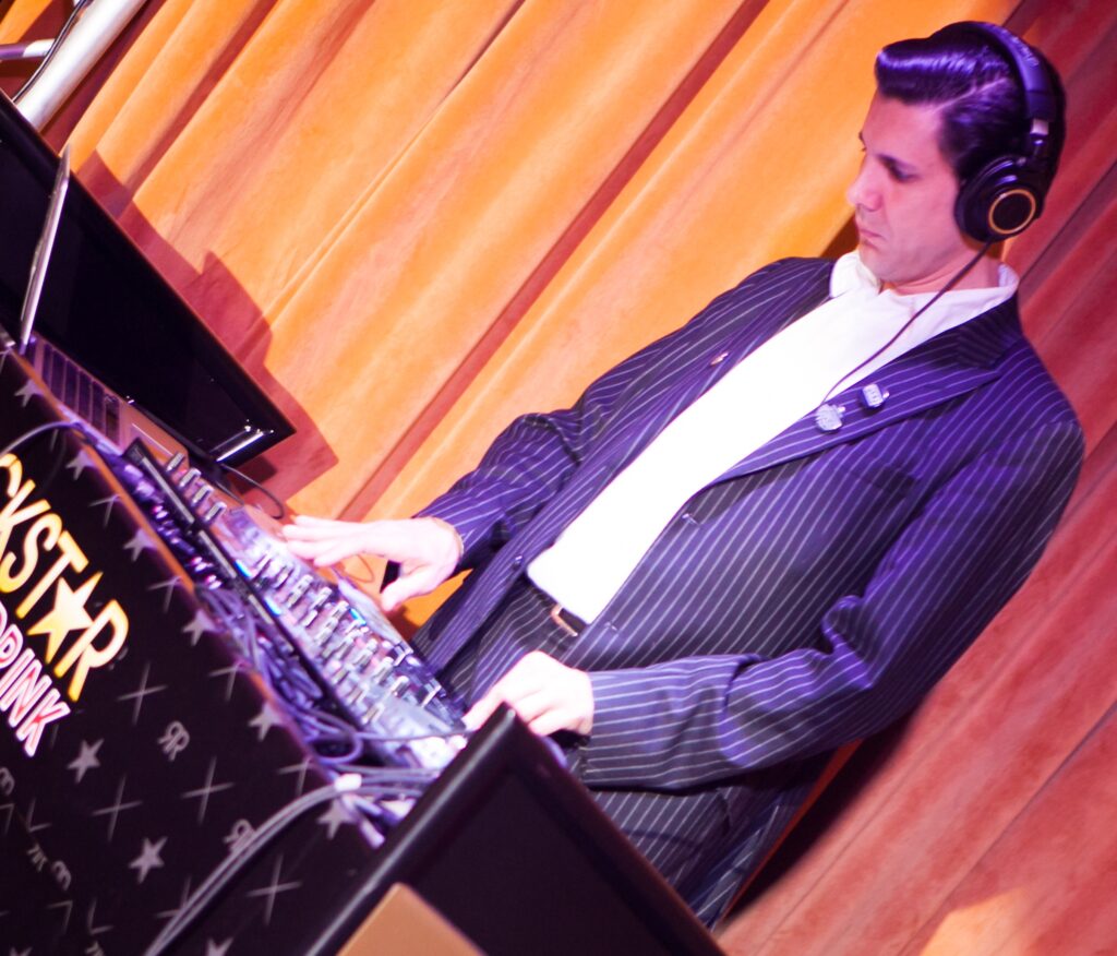 DJ Greg Gioia performing at the Belasco Hotel in Los Angeles